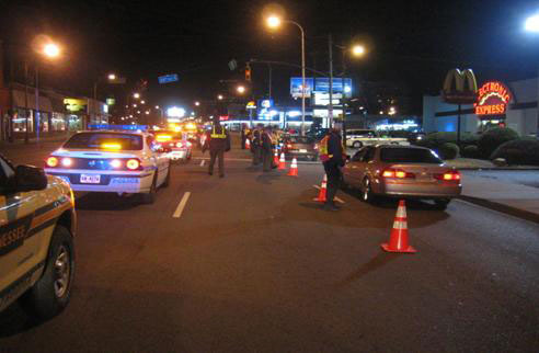 DUI checkpoint at night with proper light signals