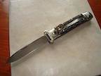 A switchblade knife on the floor