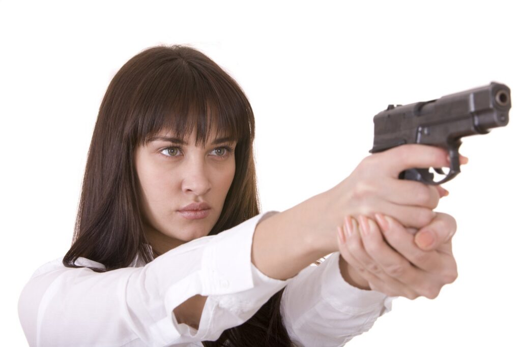 Woman aiming gun