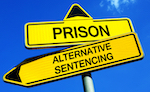 sign that reads "prison" and "alternative sentencing"