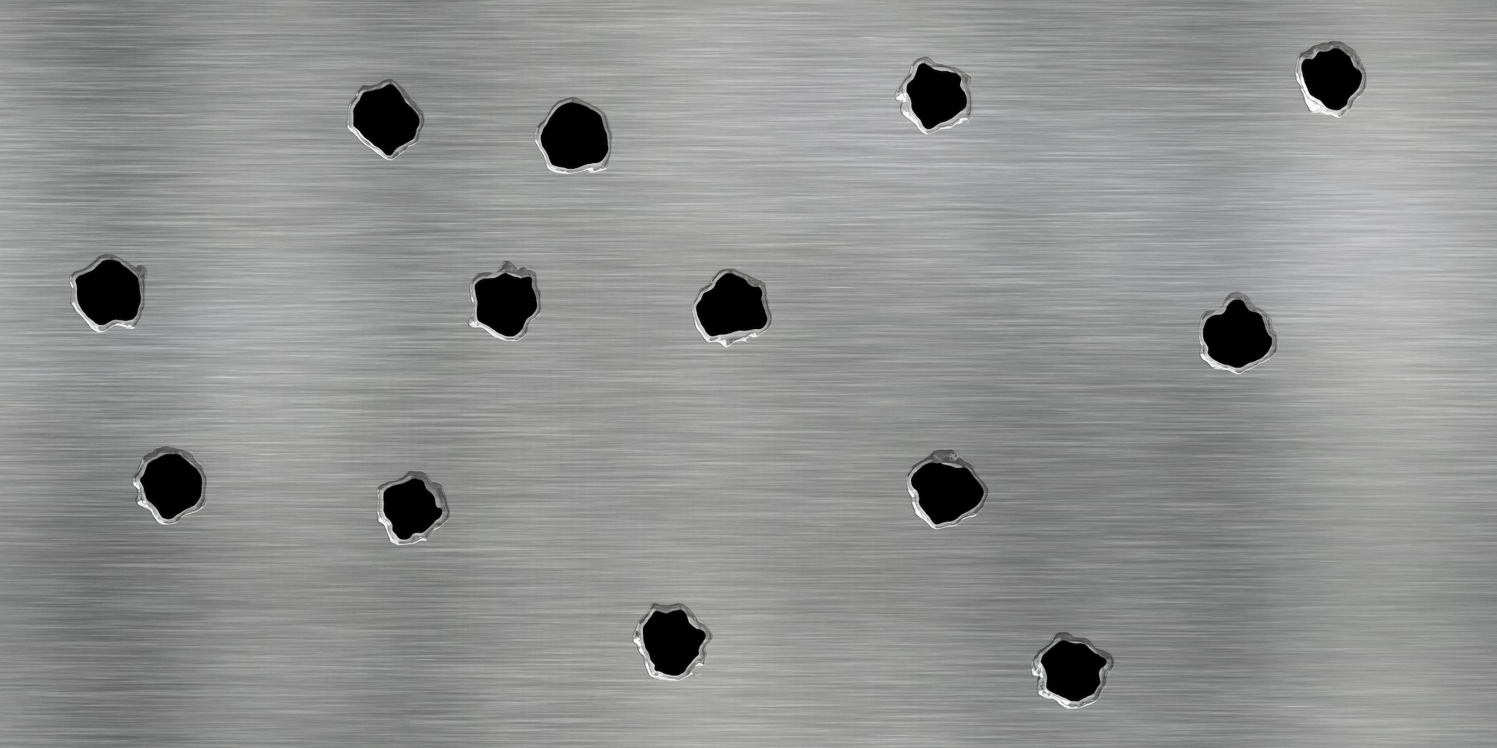 Metal wall peppered with bullet holes from bullets sold in violation of NRS 202.273.