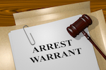file folder with heading: "Arrest Warrant"