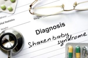 Doctor's note that says, "Diagnosis: Shaken Baby Syndrome"