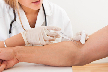 A DUI blood test being administered - the Nevada DUI limit can be measured by blood or breath alcohol content