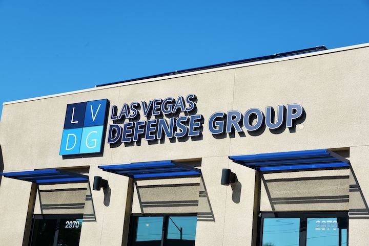 Storefront of Las Vegas Defense Group offices showing the LVDG logo