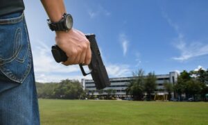 Man about to shoot gun into building in violation of NRS 202.285.