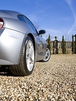 Car on gravel driveway