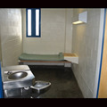 Communal toilet in a jail cell. 
