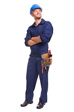 Male contractor holding a tool belt and wearing a hard hat