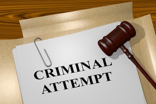 Paper with words "criminal attempt" and a gavel by it
