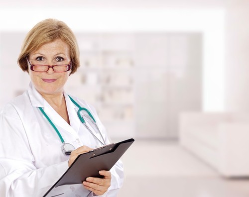 Doctor holding clipboard