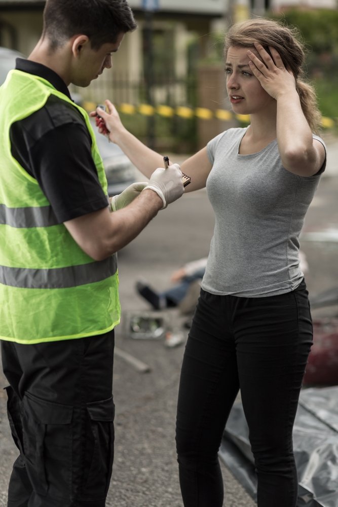 An eyewitness giving her statement to the police.