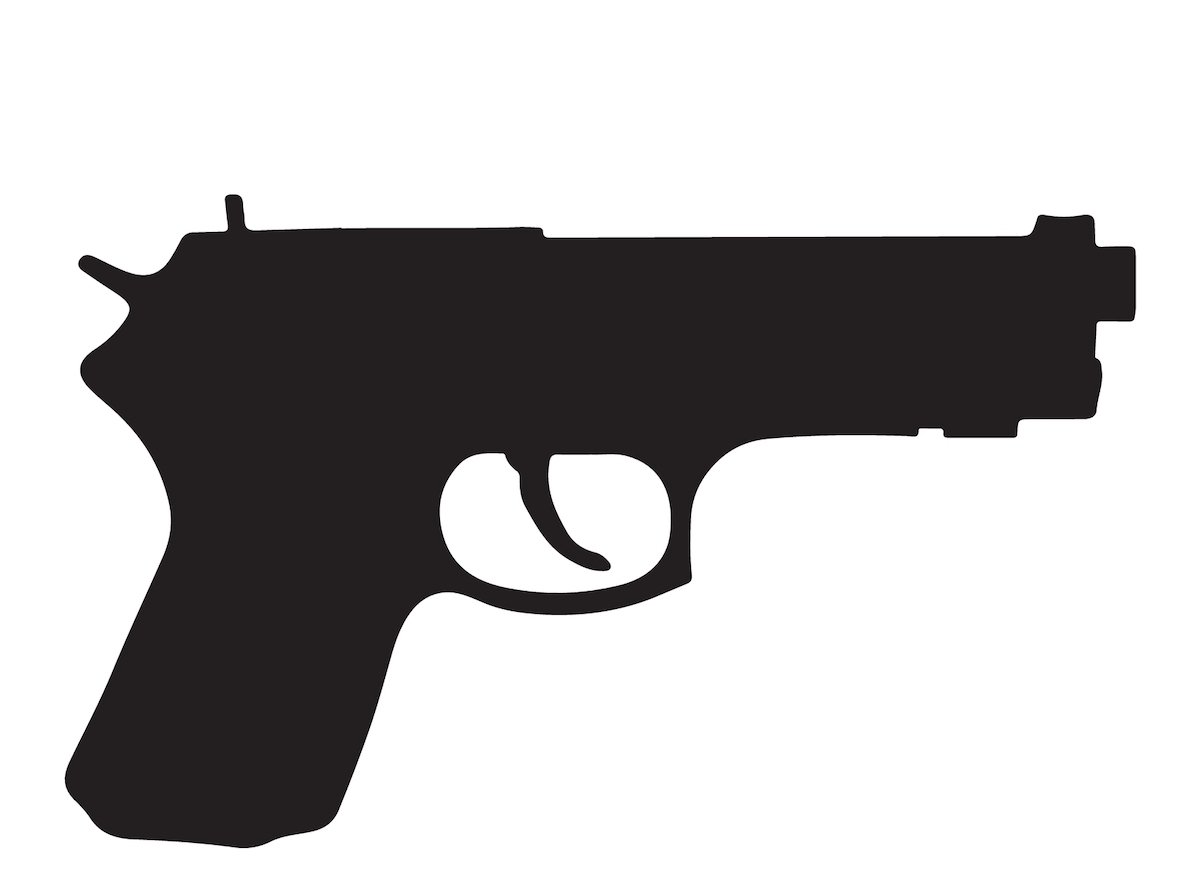 Silhouette of revolver against a white background