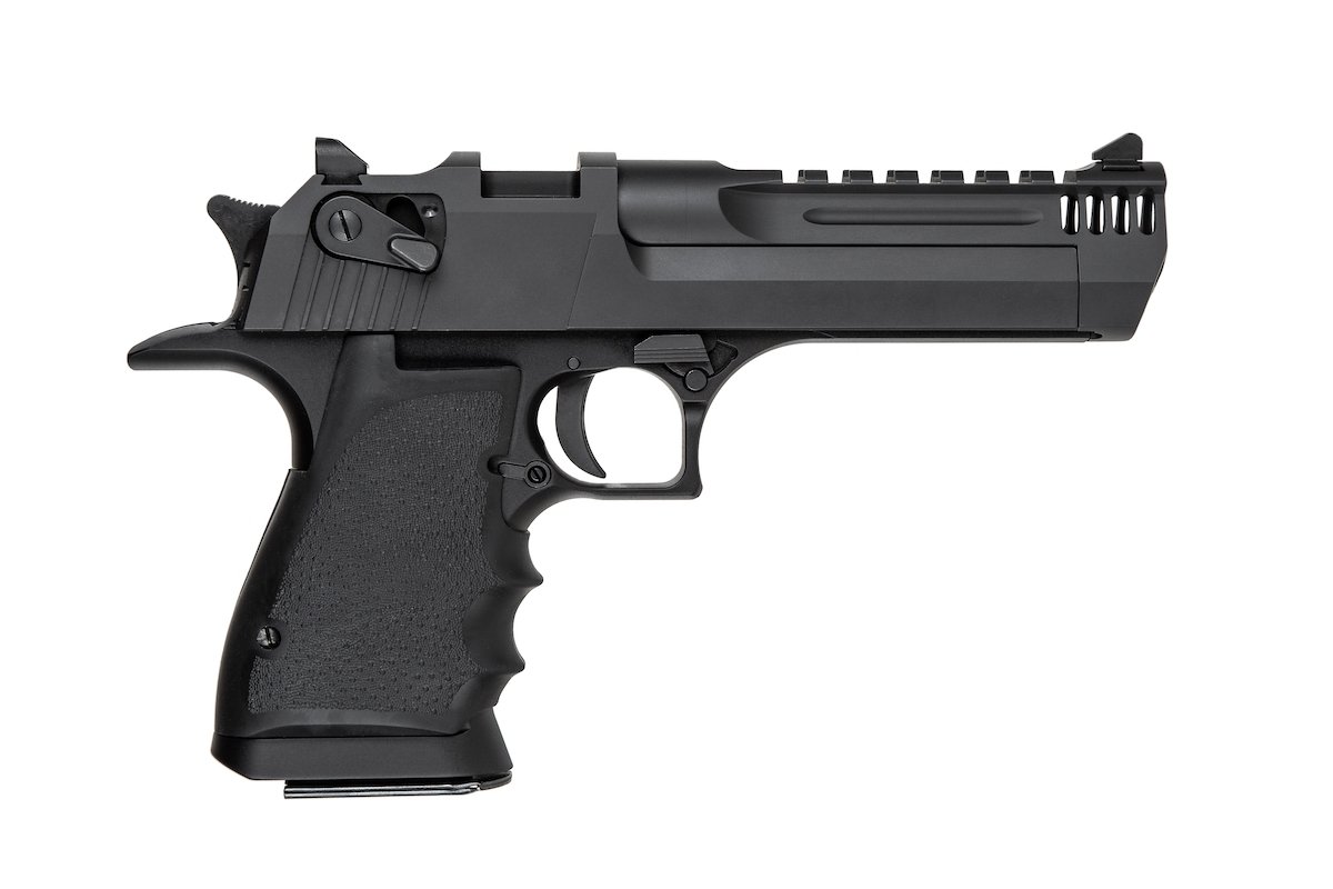 Revolver against a white background