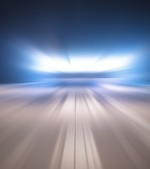 headlights in the distance on the road