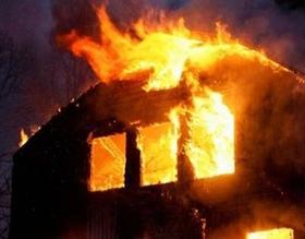 Burning building as an example of arson in violation of NRS 205.010