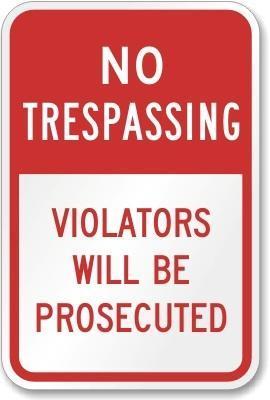 A no trespassing sign. NRS 207.200 treats fences the same as signs.