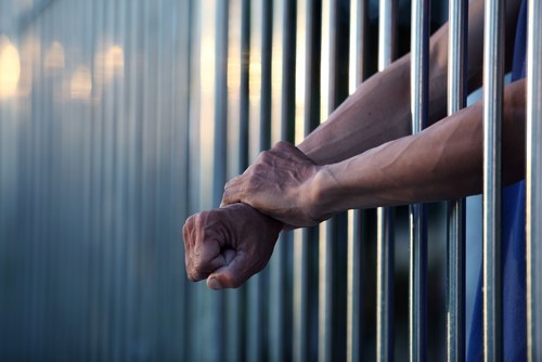 Person behind bars after being arrested for a category B felony in Nevada. 