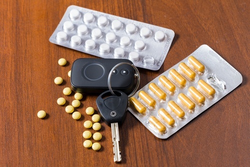 Car keys next to pills to illustrate "DUI prescription drugs" in Nevada