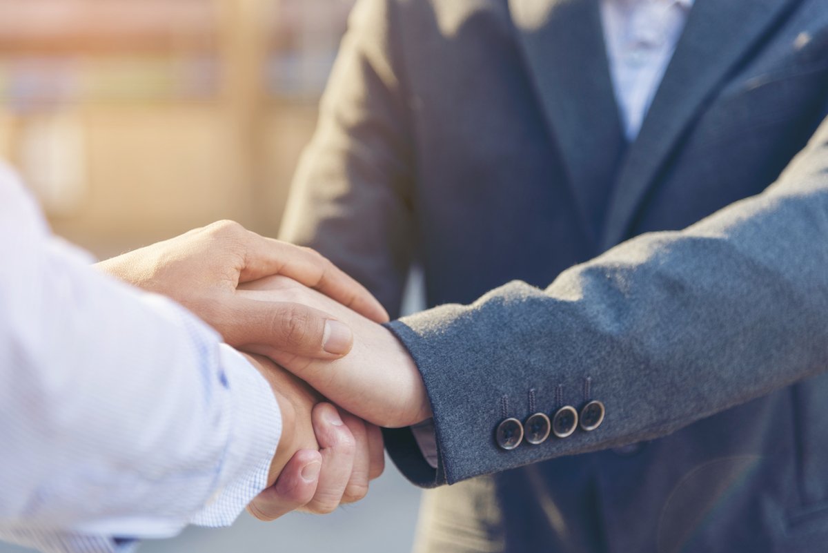 A Nevada DUI attorney shaking hands with his client after a successful court appearance