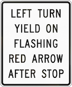 Traffic sign that says, "Left turn yield on flashing red arrow after stop"