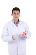 Dentist in a white coat