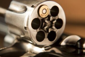 Close up of revolver with only one bullet
