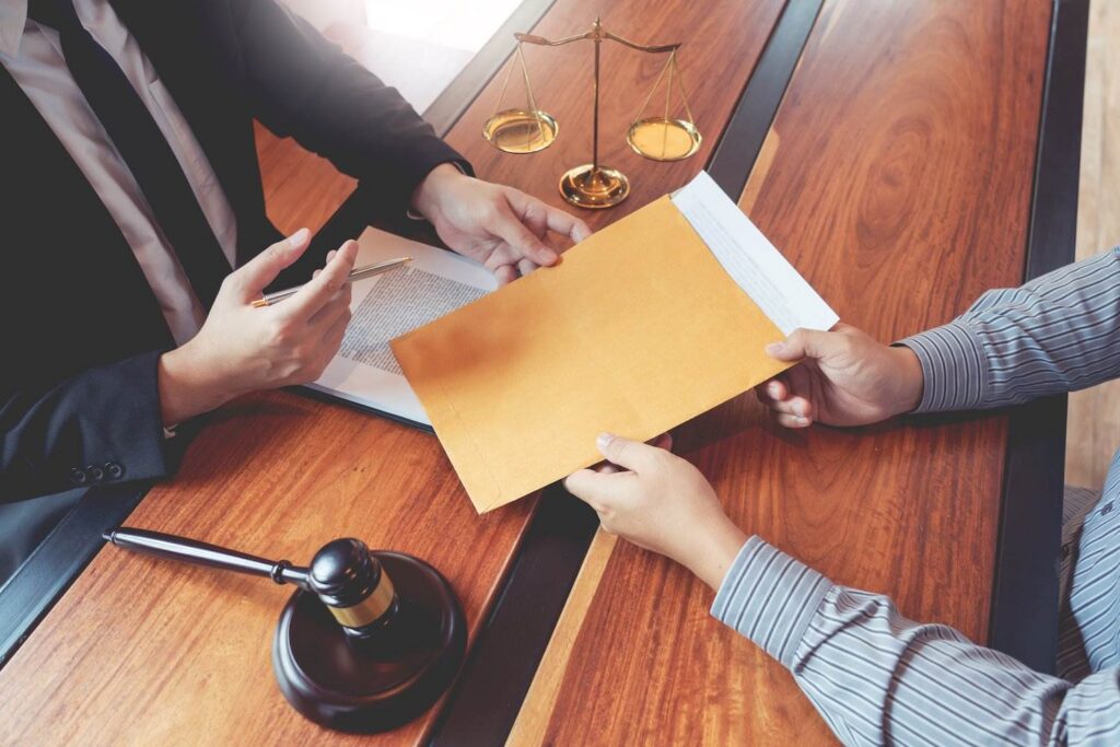 Person handing a falsified document to a judge in violation of Nevada law