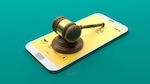 phone and gavel - furnishing phones to an inmate is a crime in Nevada per NRS 212.165