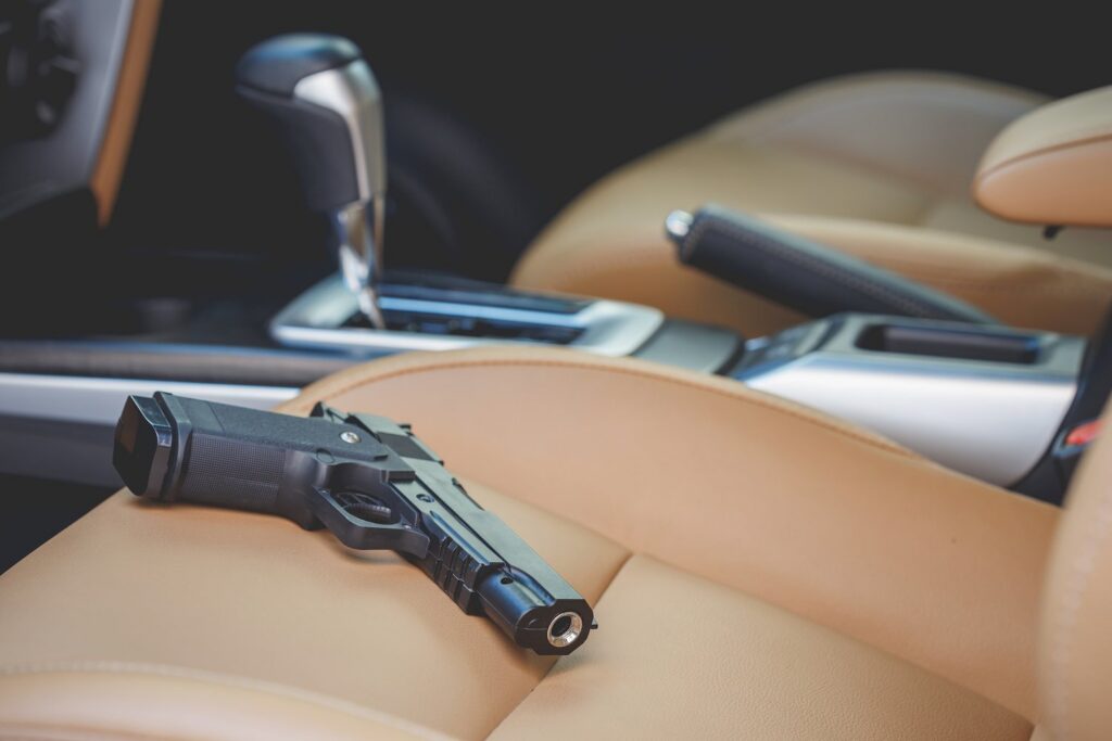 pistol lying in plain view on the driver's side seat