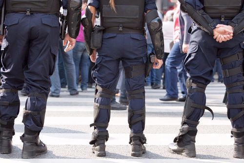 police confronting a crowd as an example of unlawful assembly in violation of NRS 203.060