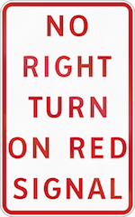 'no right turn on red sign'