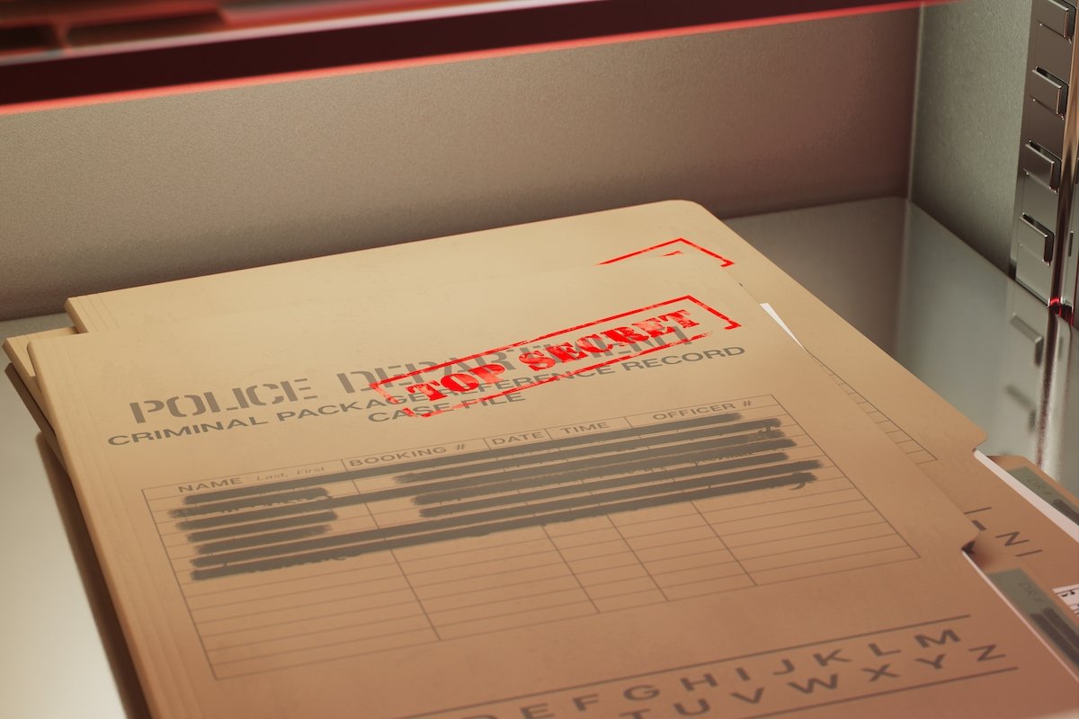 Police records in a folder in a drawer at a police station