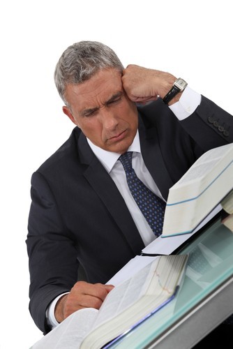 Attorney falling asleep at his desk