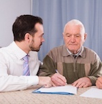 male social worker counseling a male client