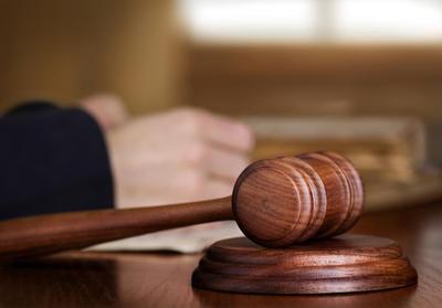 Judge's gavel on his desk as the judge is about to agree to a plea agreement